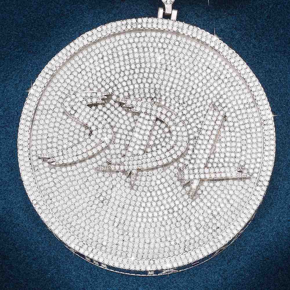 SDL round custom pendant closeup