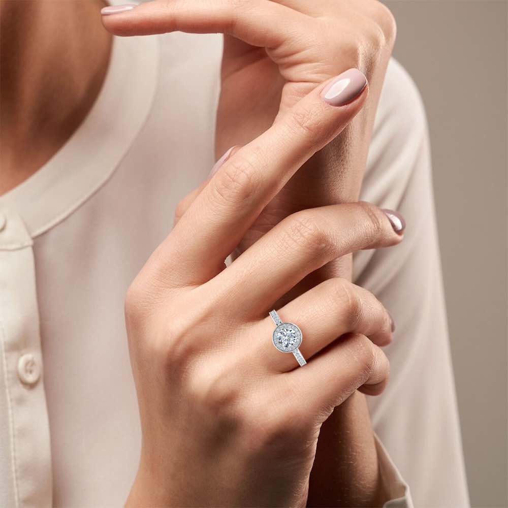 Brilliant Cut Halo Channel Set Moissanite Engagement Ring hand