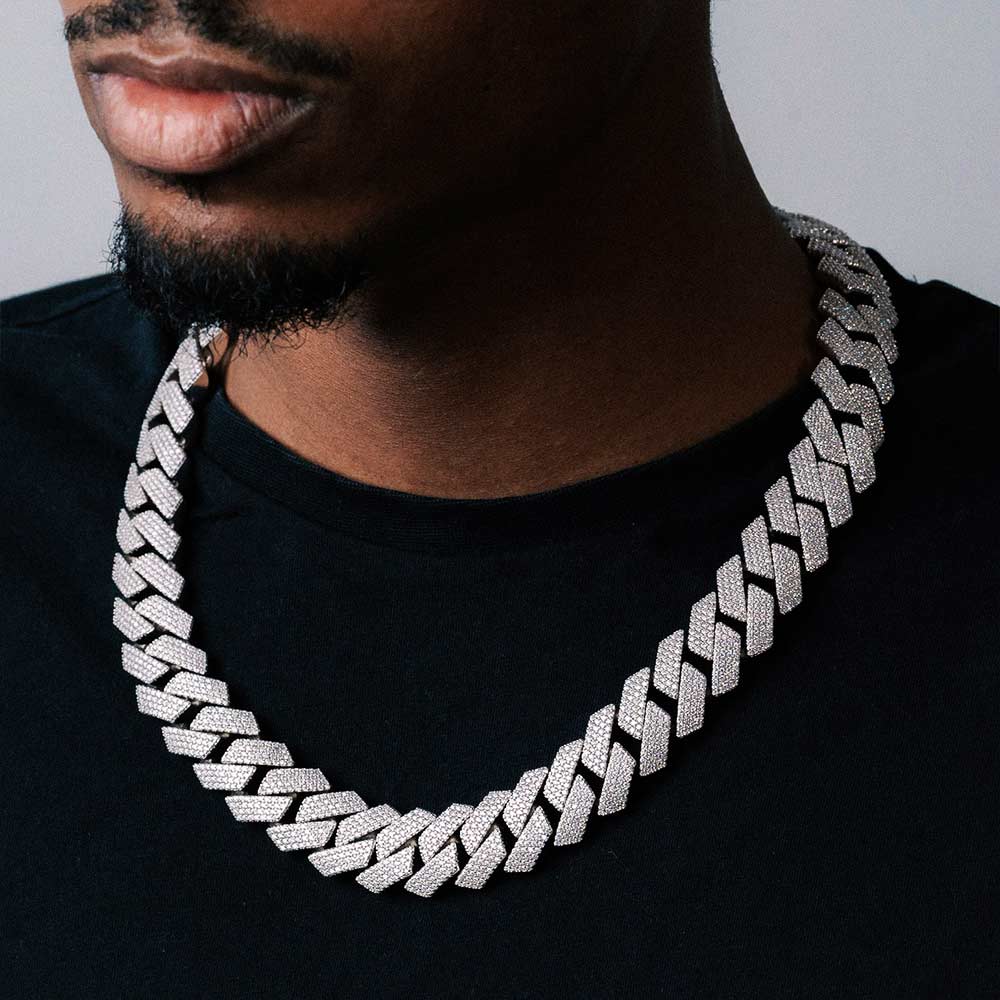 man wearing 20mm moissanite baguette cuban link chain