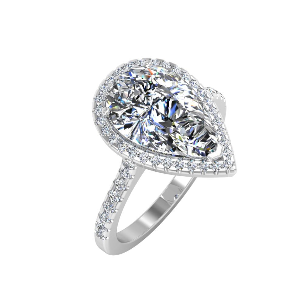 Pear Cut Moissanite Petite Halo Engagement Ring first