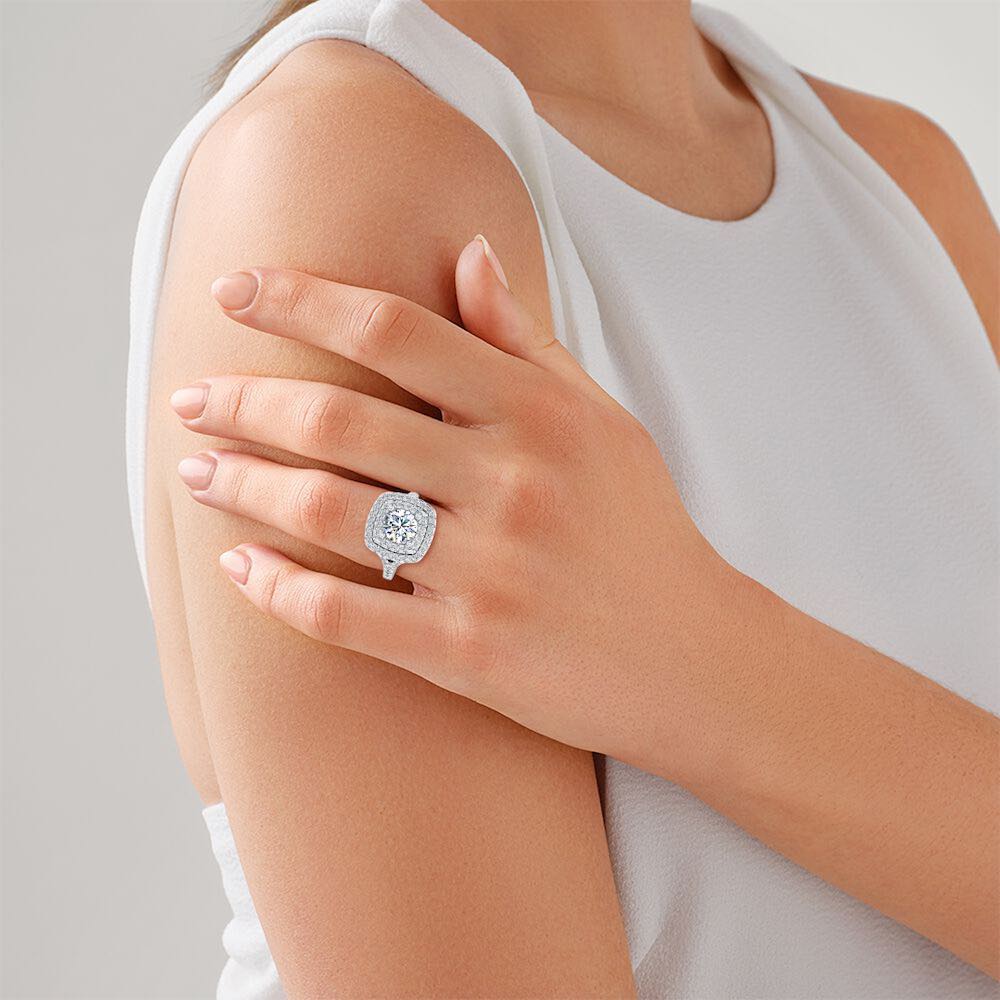 Round Brilliant Double Halo Moissanite Engagement Ring hand