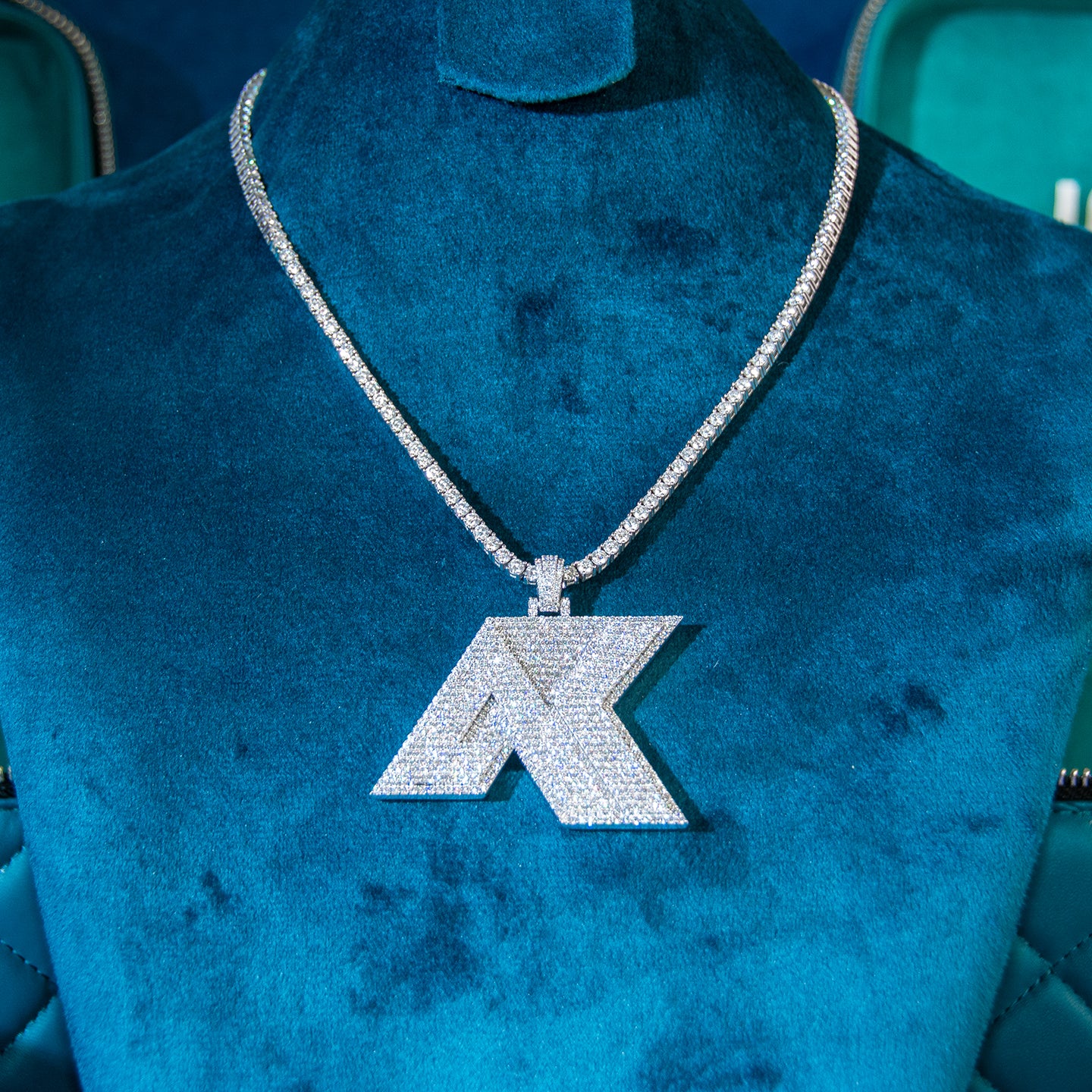 Iced out k on sale pendant