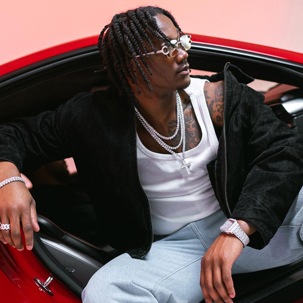 icecartel man wearing silver moissanite tennis chain