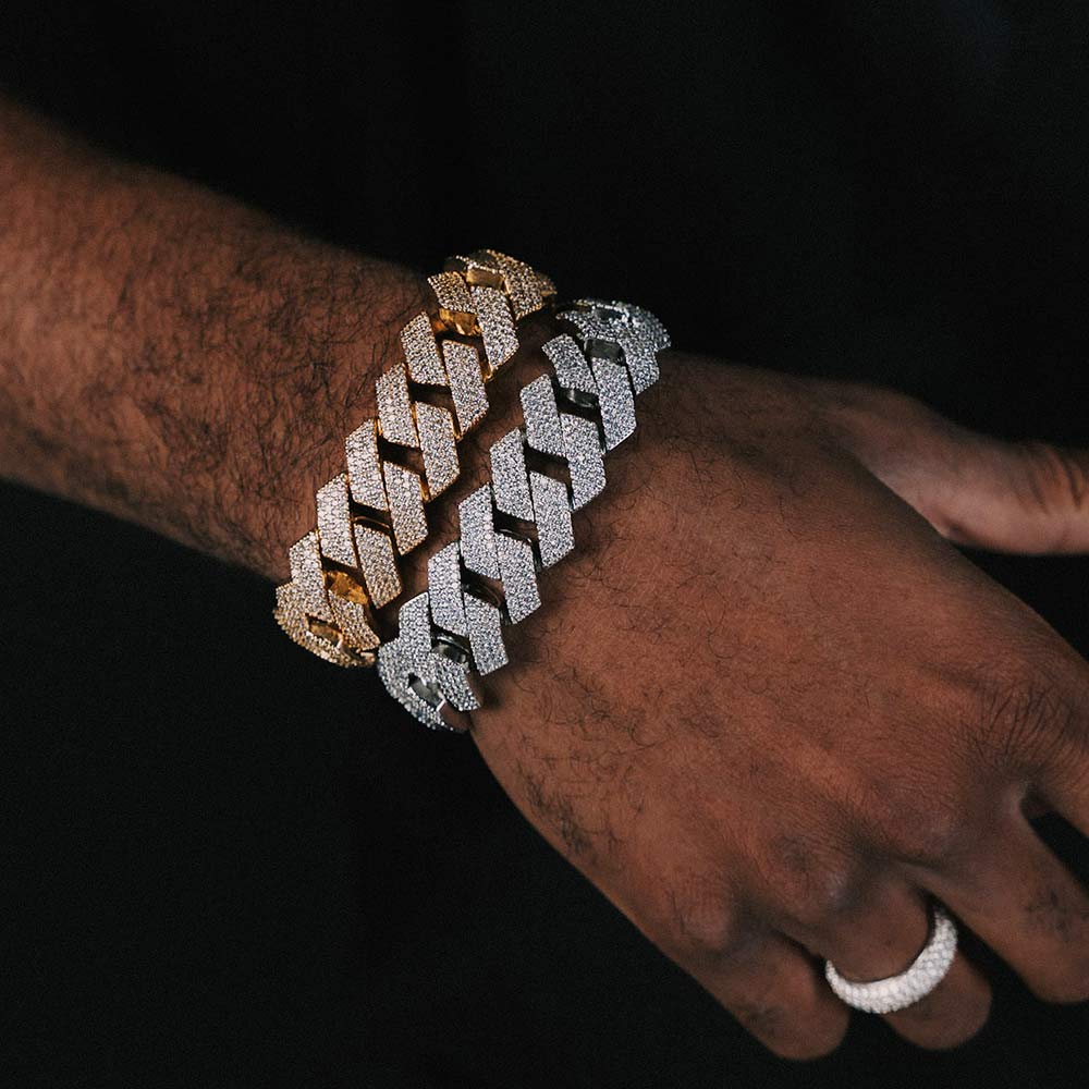 man wearing 4 row 20mm moissanite cuban link bracelets