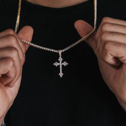 man wearing moissanite budded cross pendant