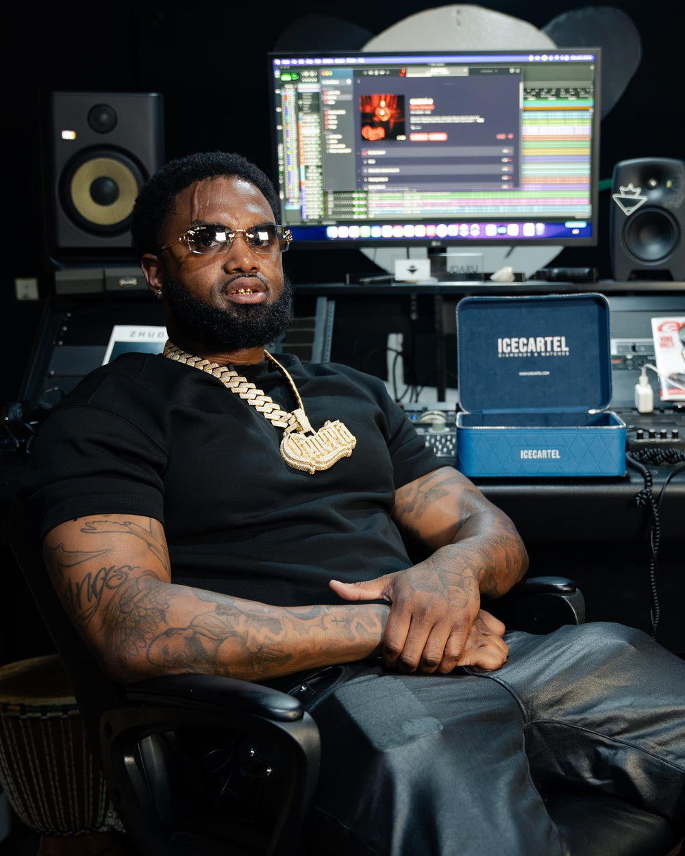 nino breeze wearing custom diamond pendant chain icecartel