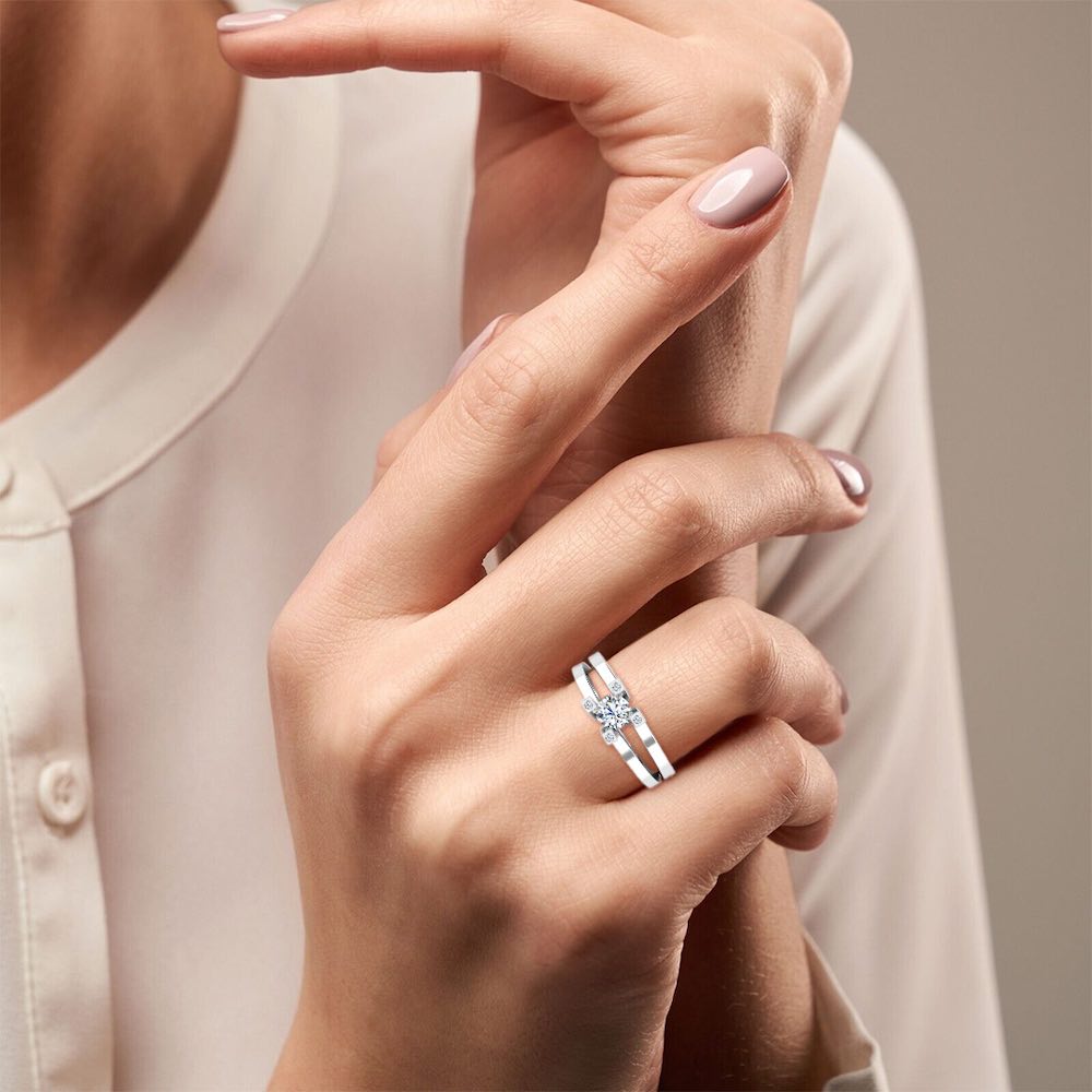 Simplistic Split Shank Moissanite Engagement Ring hand