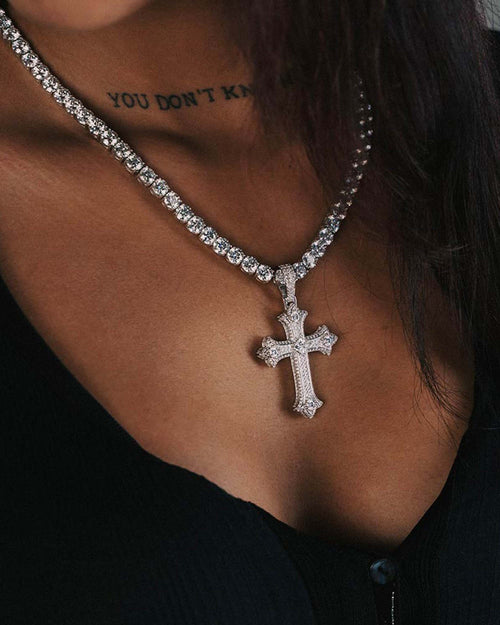 woman wearing moissanite cross pendant